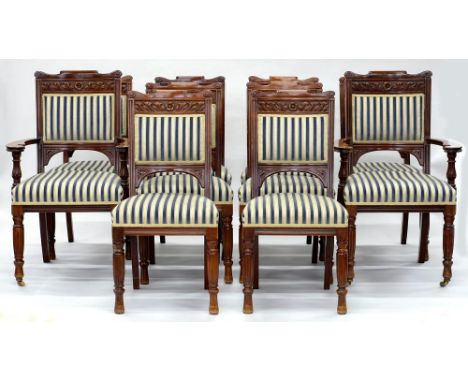 A SET OF TEN CARVED MAHOGANY DINING CHAIRS, INCLUDING TWO ELBOW CHAIRS, UPHOLSTERED IN STRIPED FABRIC WITH BRASS TRADE LABEL 