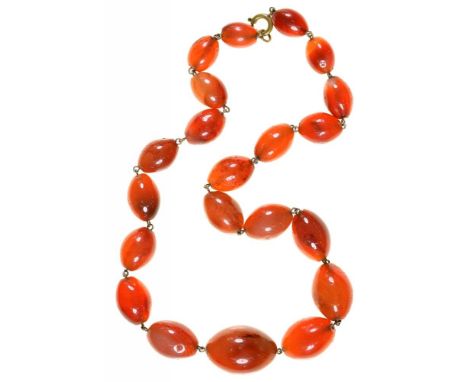 A CARNELIAN BEAD NECKLACE, THE OLIVE SHAPED BEADS GRADUATING FROM 1.2CM TO 2CM, APPROX. 45 CM LONG++IN GOOD CONDITION WITH LI