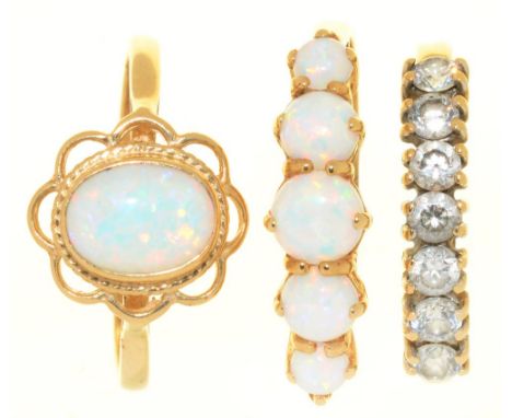 THREE 9 CT GOLD RINGS COMPRISING TWO OPAL RINGS AND A FURTHER GEM SET RING, 5G, SIZES N - P++IN GOOD CONDITION WITH LIGHT WEA