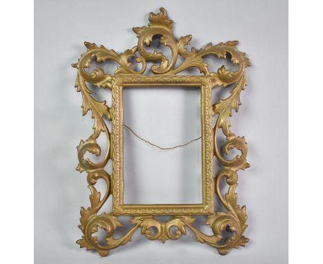 A Gilt Metal Italian Easel Back Photo Frame in the Florentine Style, 28cms High