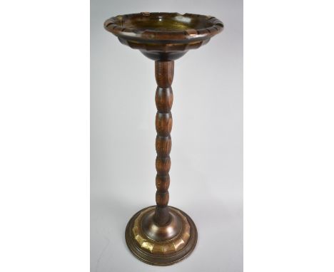 A Vintage Brass and Oak Smokers Stand with Bobbin Support, 22cms Diameter and 43cms High