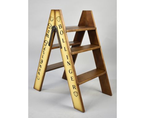 A Modern Three Step Stepladder Decorated with Various Brands of Champagne, 82cms High