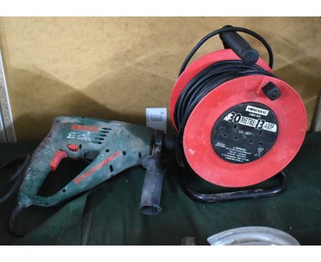 A Bosch Electric Hammer Drill Together with a Cable Reel