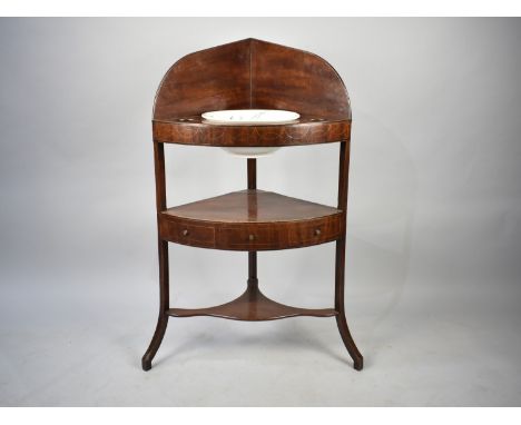 A Georgian Mahogany Corner Washstand with High Galleried Back, The Top Shelf Incorporating Wash Bowl, Centre Drawer and Small
