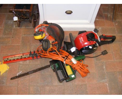 A Mountfield MHJ2424 petrol powered hedge-trimmer, together with Bosch chainsaw and protective gear 