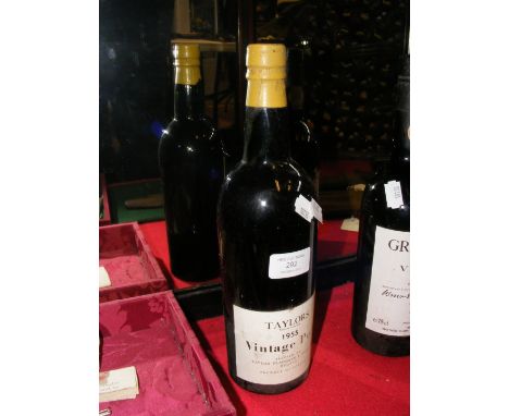 A 1955 bottle of Taylor's vintage port CONDITION REPORT Condition of liquid cannot be confirmed but to our eye, seal is good.