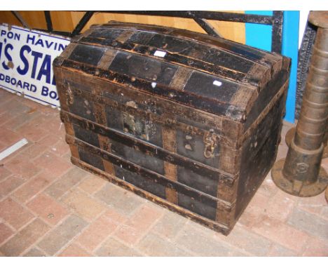 An antique dome top trunk