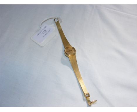 A ladies 18ct gold Tissot wrist watch CONDITION REPORT Strap marked 750.Length, 14cm.Gross weight, 30.5g.