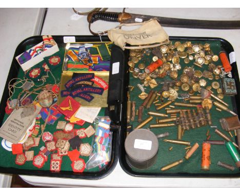 Two trays of militaria, including buttons, shoulder badges and Japanese G96 knife 