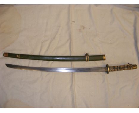 An oriental curved sword with green lacquered scabbard - overall length of sword 94cm 