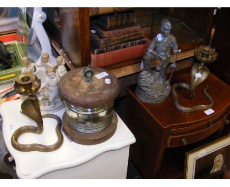 A pair of brass 'cobra' candlesticks, ships lamp, Meissen style ceramic cherub bowl etc.