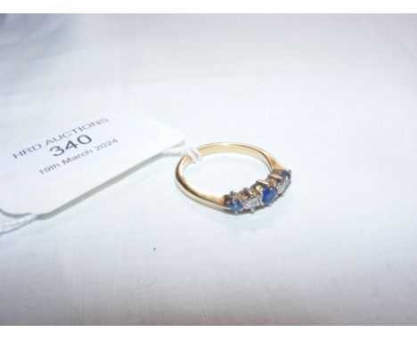 An 18ct sapphire and diamond ring CONDITION REPORT Approximate band size, O.