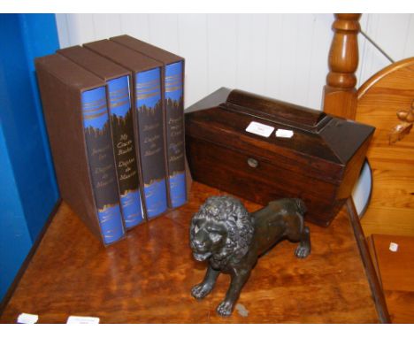 An antique tea caddy, cast metal lion and a set of Daphne du Maurier Folio Society books 