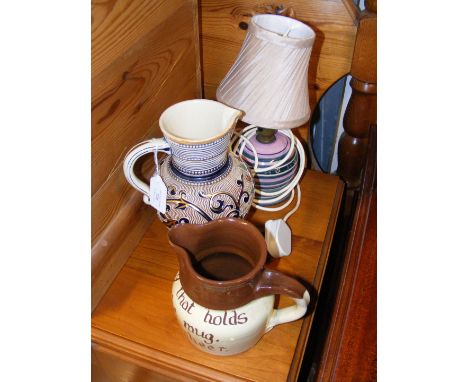 A Totland Bay, Isle of Wight, pottery lamp, together with two jugs 