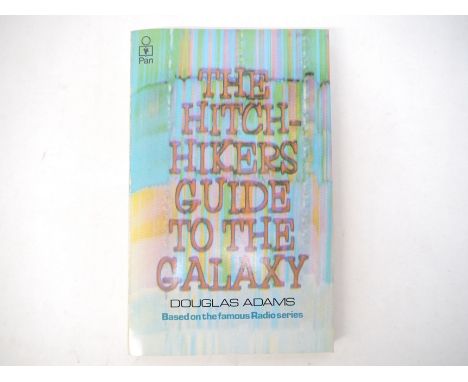 Douglas Adams: 'The Hitch Hiker's Guide to the Galaxy', London, Pan Books Ltd, 1979, 1st edition, signed by author to inside 