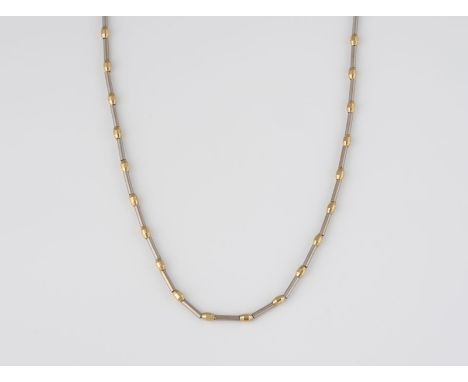 KETTE Gelbgold, Weißgold. L. 45 c, Ges.-Gew. ca. 10,6 g. Gest. 14 K.