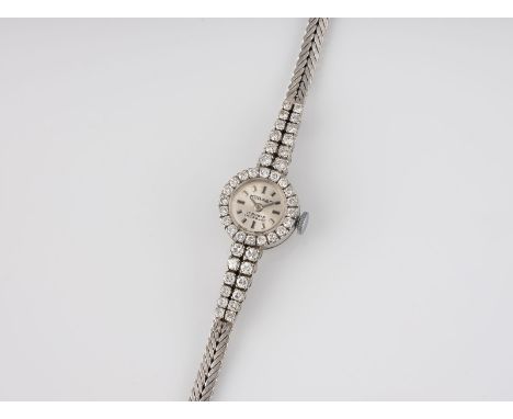 ARMBANDUHR 'MORAGO' Schweiz, 20. Jh. Weißgold. L. 16 cm, Ges.-Gew. ca. 16,6 g. Gest. 18 K. 44 Brillanten, zusammen ca. 1,4 ct