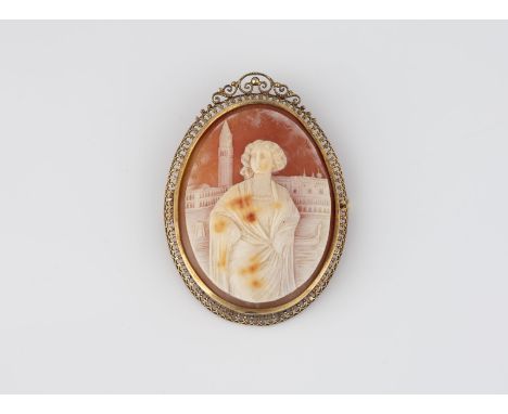 KAMEE-BROSCHE Gelbgold. 6 x 4,5 cm, Ges-Gew. ca. 20,8 g. Geprüft 14 K. Ovale Kamee mit Frauendarstellung vor dem Markusplatz 