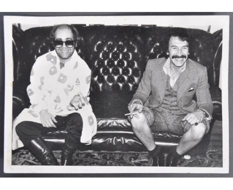 From the Estate of Peter Wyngarde - Elton John - a unique and previously un-seen 5x7" black and white photograph of Wyngarde 