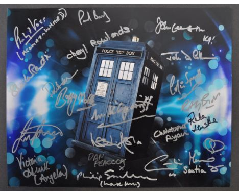 Doctor Who - An impressive multi-signed autographed 11x14" colour photograph from the series, signed by x20 stars who appeare