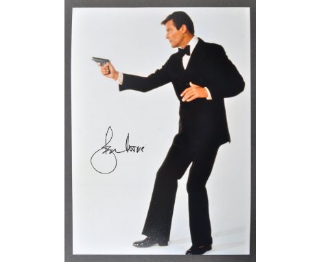James Bond 007 - Sir Roger Moore (1927-2017) - a stunning signed 7.5x10.5" colour photograph of Moore as Bond in a classic po