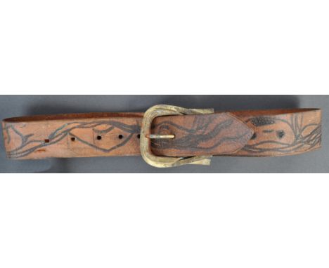 From the Estate of Peter Wyngarde - an unusual believed self-tooled leather costume / prop belt. The belt appearing to be of 