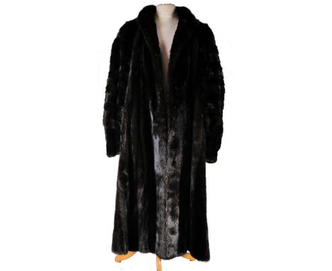 From the collection of Valerie Leon - a vintage good quality three quarter-length mink fur coat, in black and brown fur with 