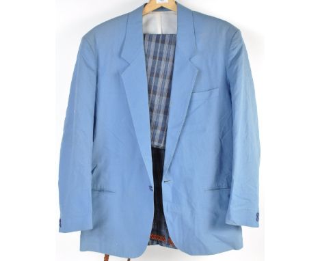 From the Estate of Peter Wyngarde - a suit ensemble comprising; a blue ' First Concept Edition ' made suit jacket, along with
