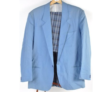 From the Estate of Peter Wyngarde - a suit ensemble comprising; a blue ' First Concept Edition ' made suit jacket, along with