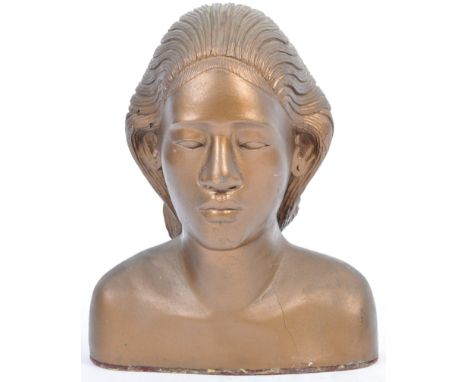 From the Estate of Peter Wyngarde - a vintage plaster bust of an African female figure. Plaster construction, with gold paint