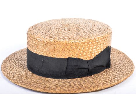 From the Estate of Peter Wyngarde - Unknown Production - an original vintage straw boater hat, believed to have been used in 