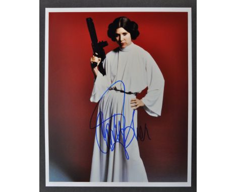 Star Wars - Carrie Fisher (1956-2016) - Princess Leia - a superb autographed 8x10" colour photograph of Fisher as Princess Le