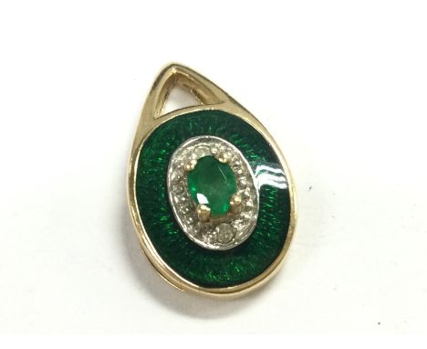 A 14ct gold emerald and diamond enamel pendant. Total weight 2g . Postage category A