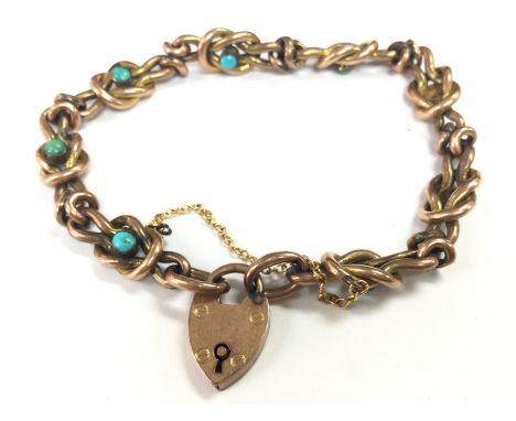A 9ct gold bracelet set with turquoise , total weight 16.4g . Postage category A