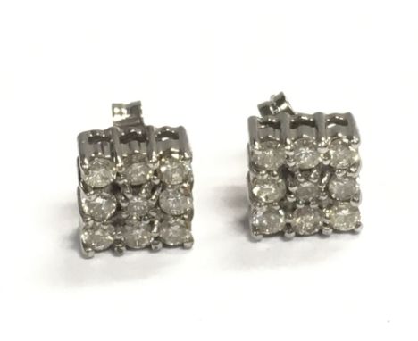 A 9ct white gold square diamond cluster earrings , 3G. Postage category A
