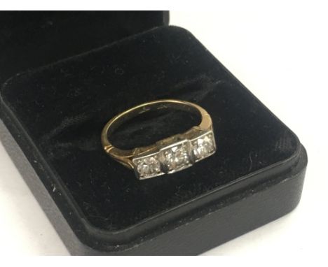 An 18ct gold 1920s Approx 0-75ct three stone diamond ring. Size K. Total weight 3.3G. Postage category A