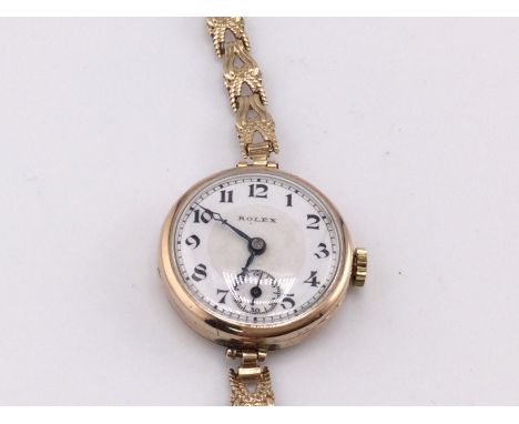 A 9ct gold vintage Rolex watch. Winds and runs. 17.31g total.