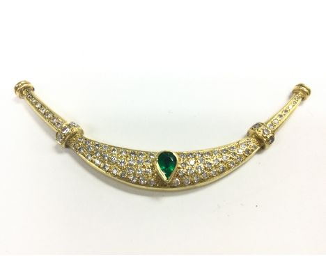 An unmarked gold emerald and diamond set pendant , total weight 9.4g . Postage category A