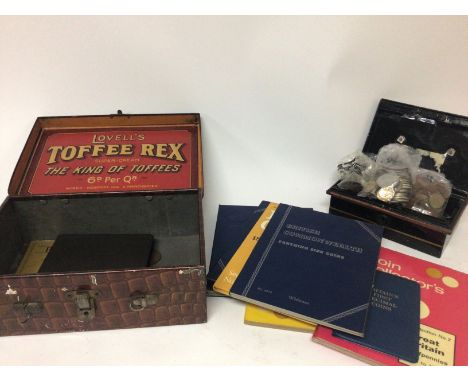 A Vintage Lovells Toffee tin in the form of a crocodile skin case and a collection of British coins in blue albums and world 