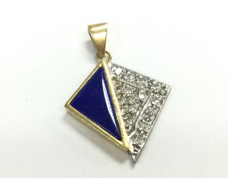 A high carat gold diamond and lapis lazuli set pendant , 2.7g. Postage category A