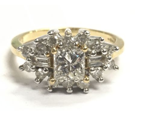 An 18ct gold diamond cluster ring , 4.9g total weight. Size M/N Postage category A