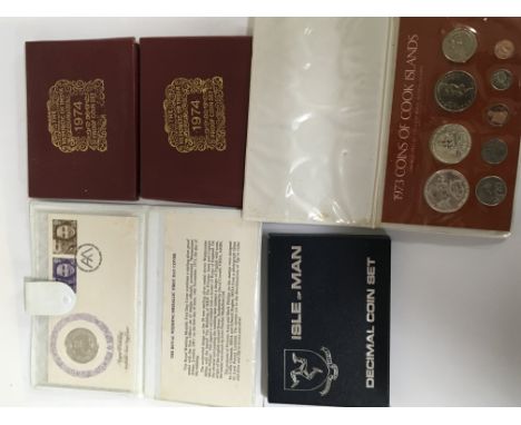 Two 1974 proof con sets The republic of India an Isle of Man Decimal coin set 1973 Cook Islands coin set and Royal wedding si