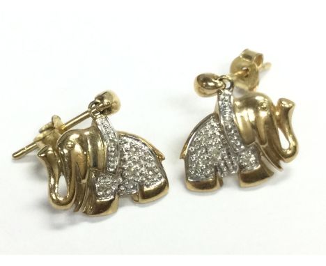 A 9ct gold diamond elephant drop earrings. Total weight 1.9g postage category A