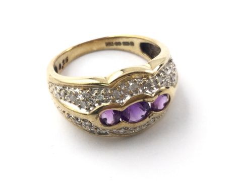 9ct yellow gold dress ring set with 3 oval amethyst and diamonds. Diamonds approx 0.25ct size Q