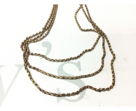 A 9ct gold triple chain necklace. 20.90g and 45cm long. Postage A