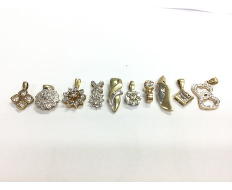 A collection of 9ct gold diamond set pendants , total weight 10.7g