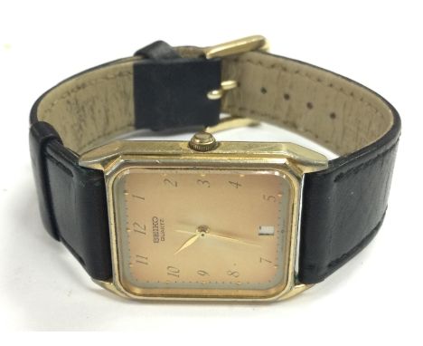 A Gents 9ct gold cased Seiko watch and another Seiko watch. Postage category A
