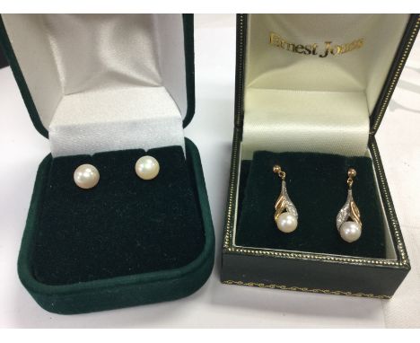 Two pairs of 9ct gold diamond and cultured pearl earrings , total weight 3.1g. Postage category A