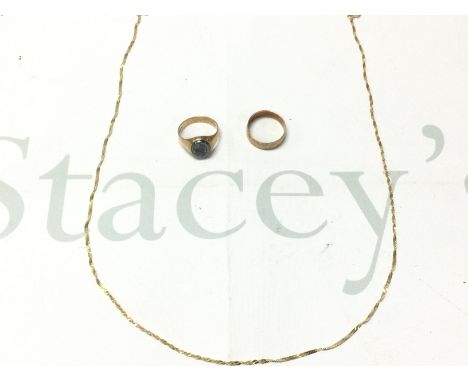 Two 9ct gold rings and a 9ct gold chain. 9.17g total.