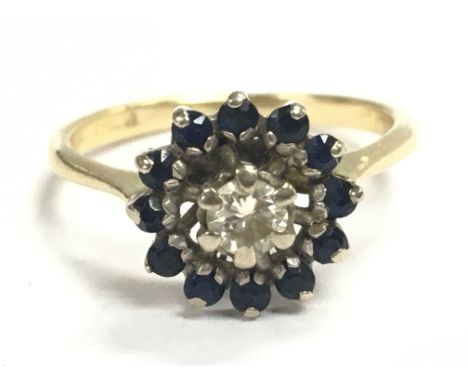 An 18ct gold sapphire and diamond cluster ring , size M. Total weight 3.2g Postage category A